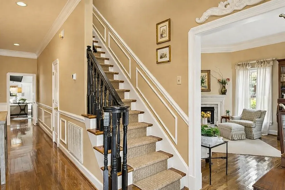 Nashville foyer with crisp wainscoting and precision paint lines