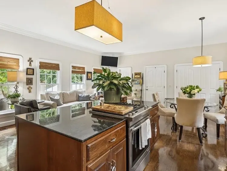 Open kitchen and dining area with fresh wall and trim paint in Nashville home